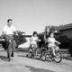 Bob Crane goes for a bike ride with his kids Debbie, Karen, and Robert Jr., 1963 (Photo: ABC Photo Archives/ABC via Getty Images)